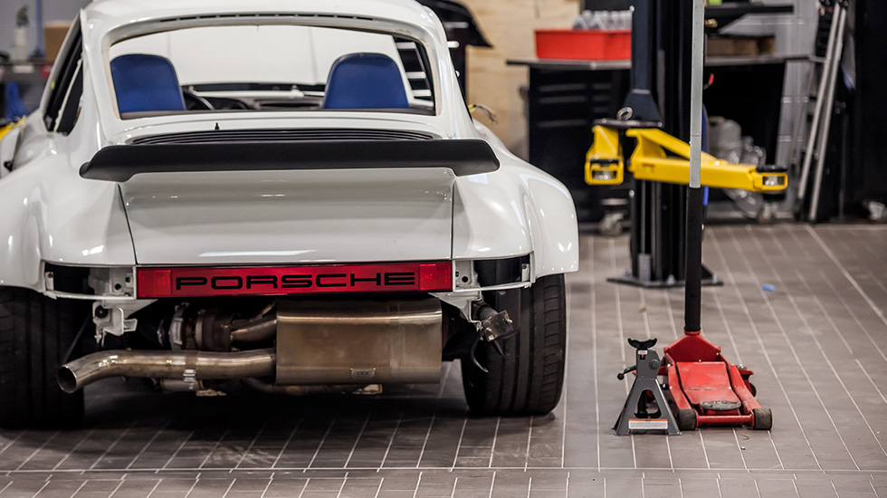 Service area flooring at Porsche auto dealership