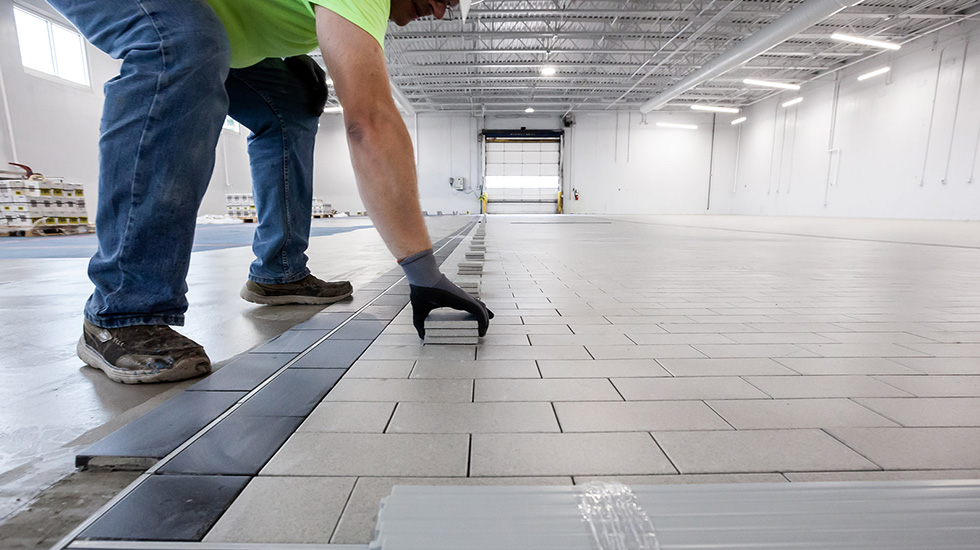 installation of flooring at auto dealership