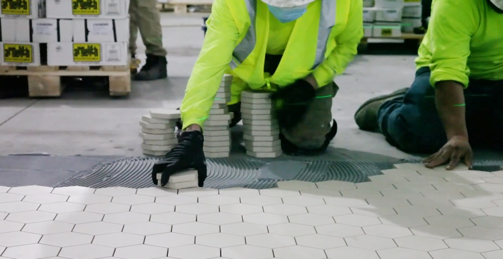 installing insdutrial tile flrooing at dairy plant