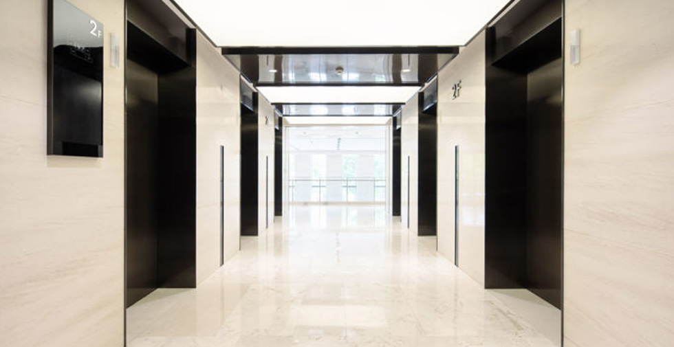 natural stone commercial flooring in hotel lobby