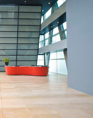  natural stone flooring at auto dealership